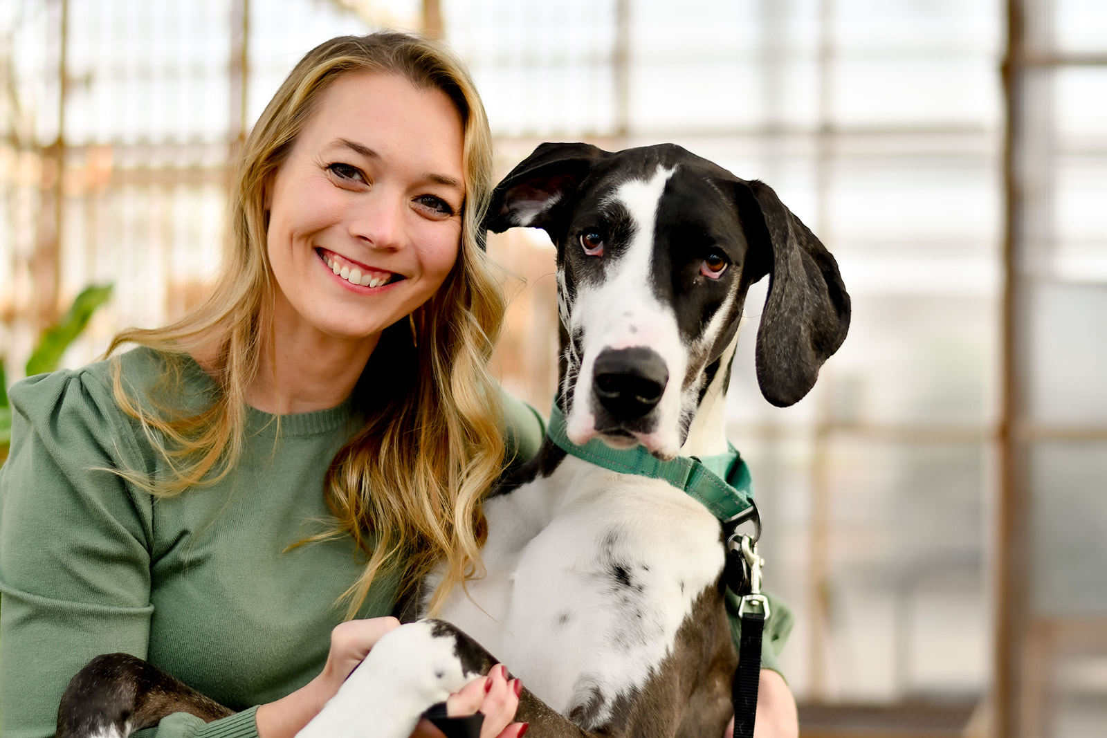 Dr. Lackovic and her dog smiling